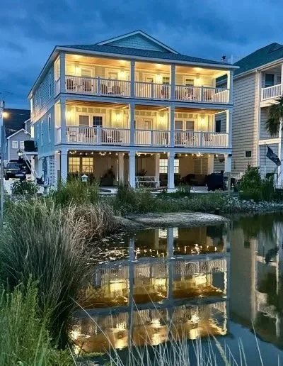 A beach house at dusk