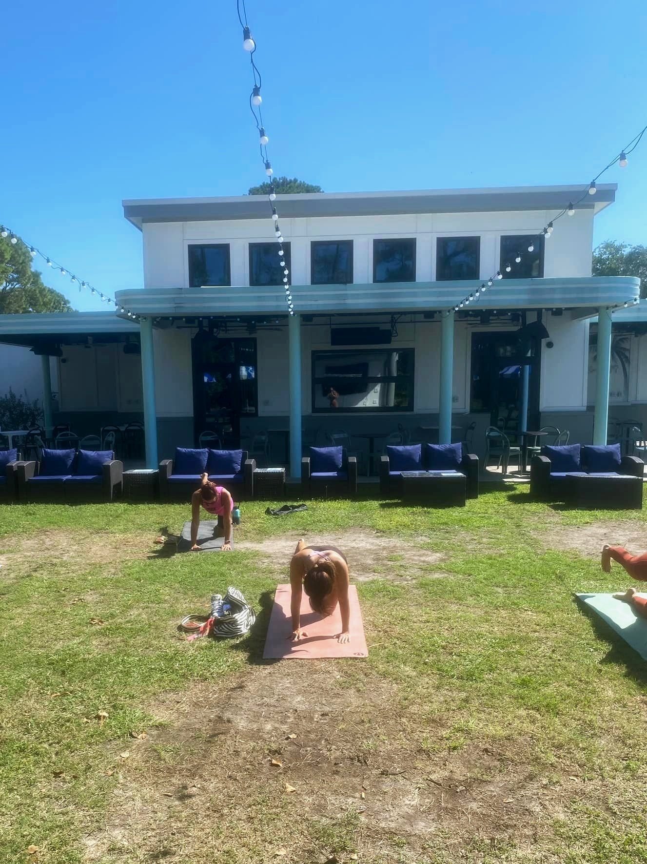 An outdoor mat class at a local venue